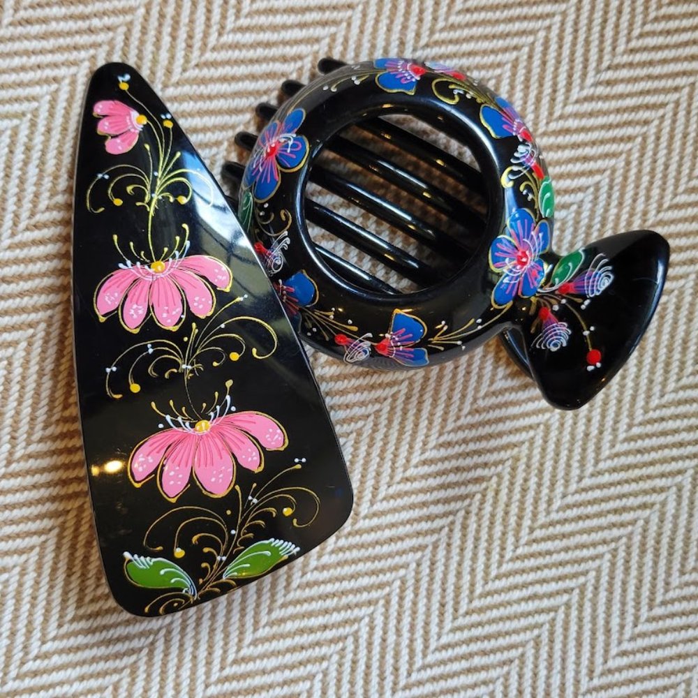 Two painted black hair clips